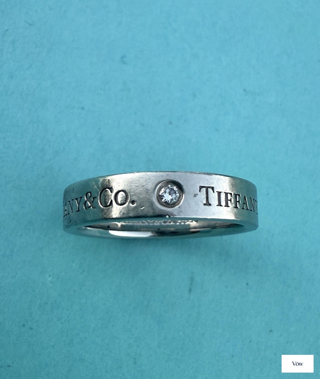 Tiffany & Co. Platinum Logo Band Ring — 3 Diamonds, Size 5.75 — Authentic Pre-Owned