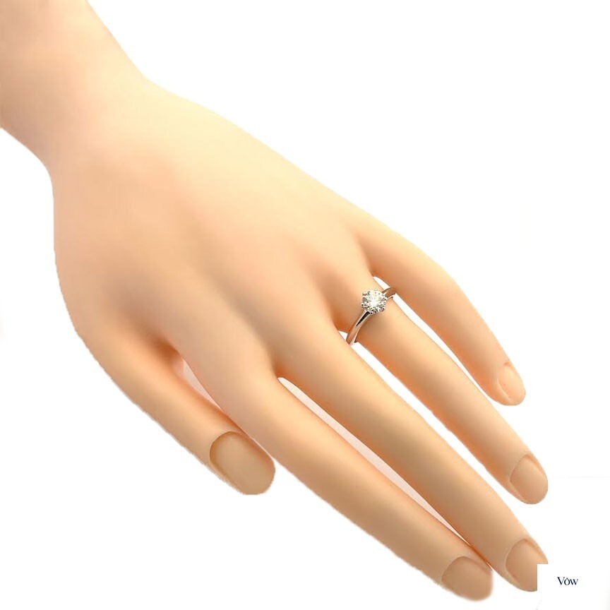 Tiffany & Co. Solitaire Engagement Ring — 0.85ct Round, Platinum — Authentic Pre-Owned