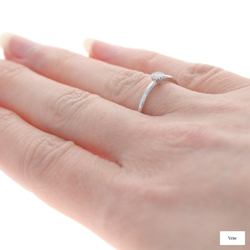 Tiffany & Co. Bezel Solitaire — 0.12ct Round, 18k White Gold — Authentic Pre-Owned