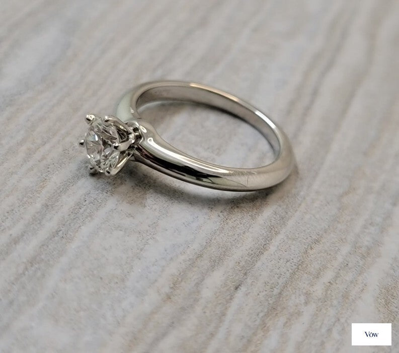 Tiffany & Co. Round Brilliant Solitaire — 0.72ct Diamond, Platinum — Authentic Pre-Owned