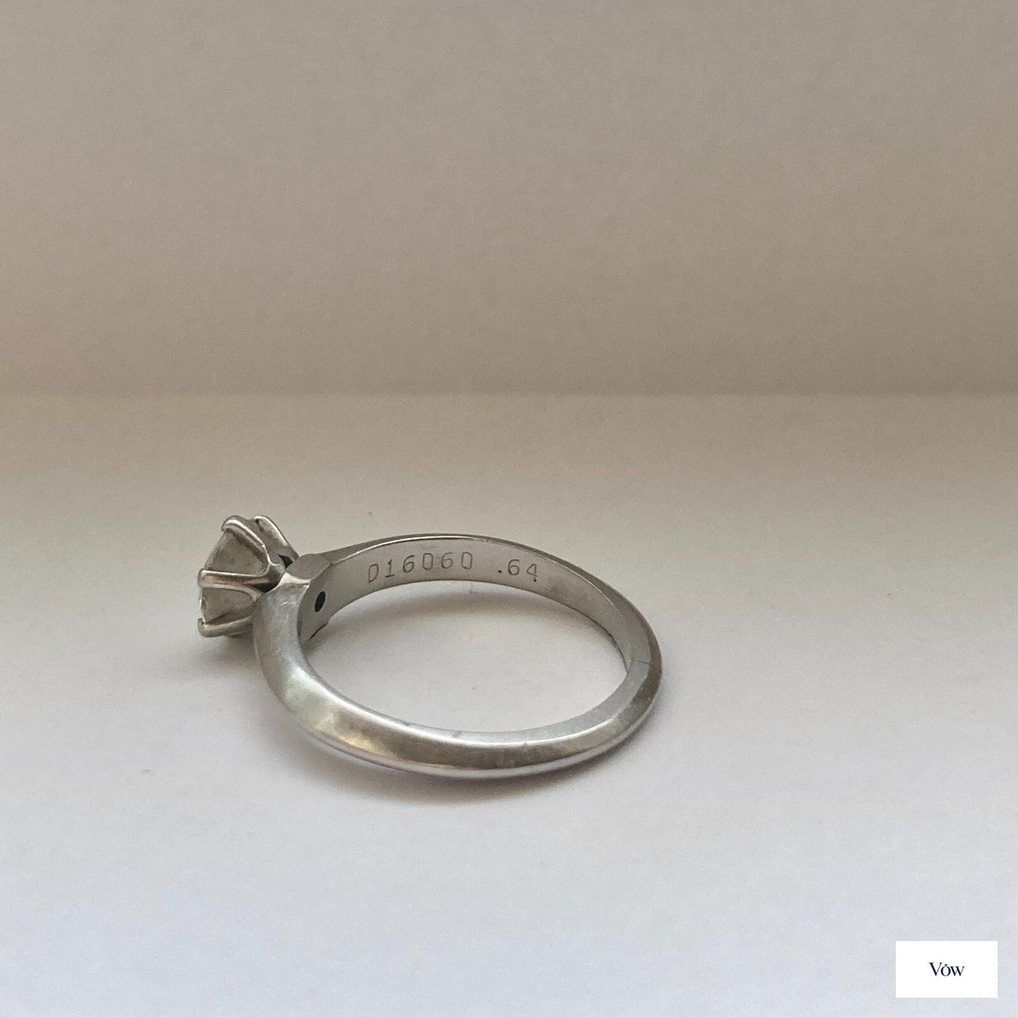 Tiffany & Co. Solitaire Diamond Ring — 0.64ct Round Brilliant, Platinum — Authentic Pre-Owned