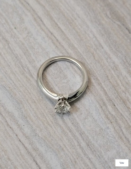 Tiffany & Co. Round Brilliant Solitaire — 0.72ct Diamond, Platinum — Authentic Pre-Owned
