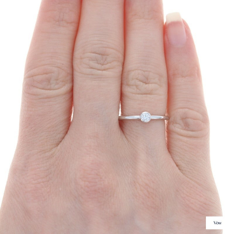 Tiffany & Co. Bezel Solitaire — 0.12ct Round, 18k White Gold — Authentic Pre-Owned