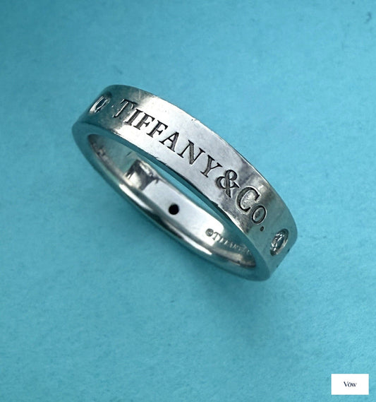 Tiffany & Co. Platinum Logo Band Ring — 3 Diamonds, Size 5.75 — Authentic Pre-Owned