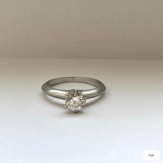 Tiffany & Co. Solitaire Diamond Ring — 0.64ct Round Brilliant, Platinum — Authentic Pre-Owned