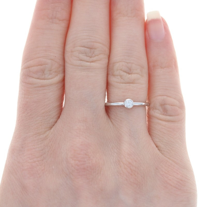 Tiffany & Co. Bezel Solitaire — 0.12ct Round, 18k White Gold — Authentic Pre-Owned